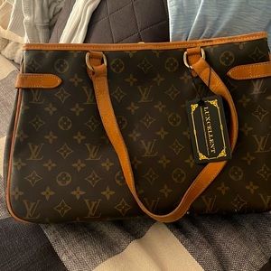 Louis Vuitton bought from Fashionfile unused tag on authenticated Louis